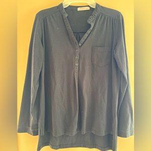 Long sleeve blouse. Looks lighter in photos.